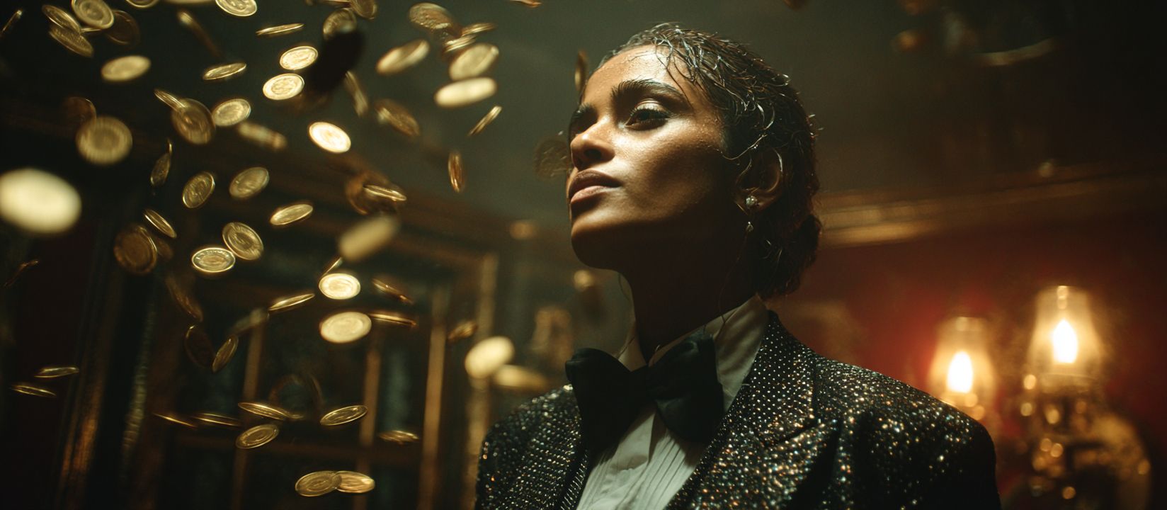 A stylish woman in a shiny dinner jacket with coins flying around is a symbol of wealth and confidence at BG33 Casino.